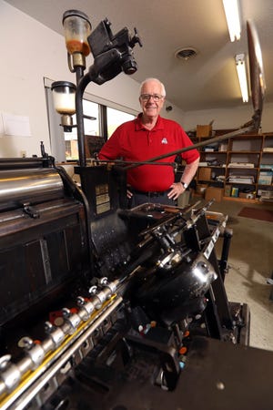 Dean Cole is a Zanesville entrepreneur who own's Tom's Print Shop. Although he does not run the presses, he is fond of the company's Heidelberg press, which can print things like door hangers, complete with cutouts.