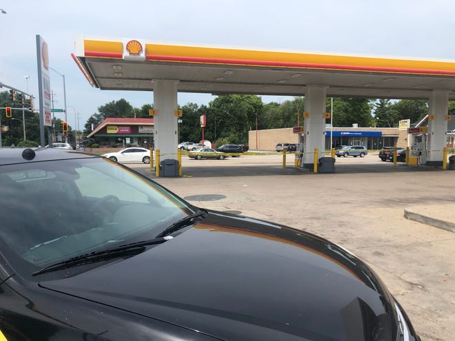Peoria police block off a gas station at the corner of Knoxville and Nebraska on Wednesday, Aug. 3, 2022, as investigators from the state Revenue Department are inside.
