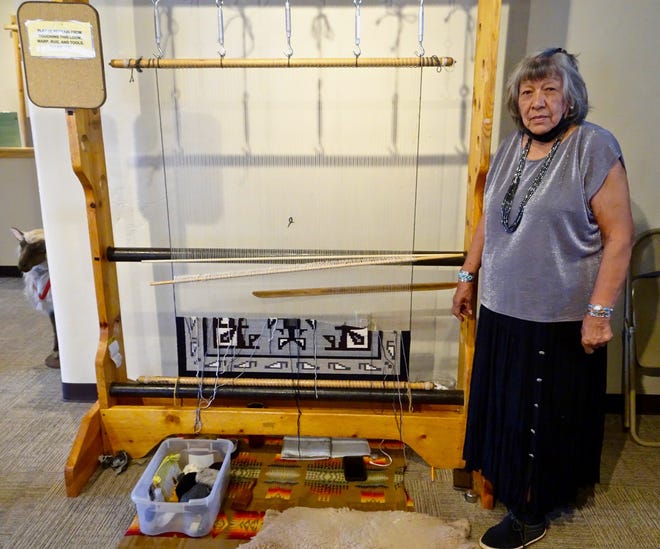 Ruby Hubbard, a Navajo weaver at Hubbell Trading Post in Ganado, Arizona, started this Two Grey Hills rug in early July 2022. She plans to retire when it is complete, a process which usually takes four months or more.