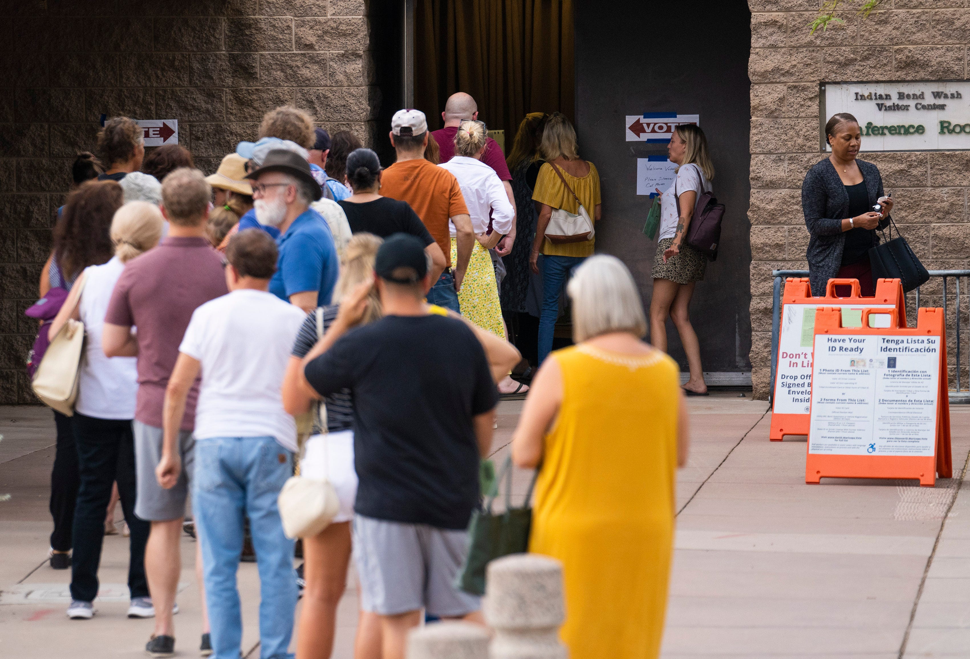 Voters wait in line to cast their vote at the Indian Bend Wash Visitor Center in Scottsdale on Aug. 2, 2022.