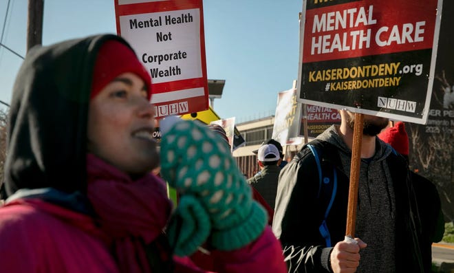 Mental health care workers picket outside of Sacramento Medical Center in protest of long wait times for patients and overwhelming caseloads at Kaiser Permanente facilities on Dec. 16, 2019.