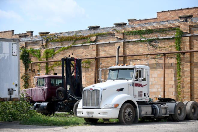 Imperial Aluminum officials are receiving help from Carroll County commissioners, who are seeking $105,000 of state grant funding to pay for the clean up at this former industrial plant.