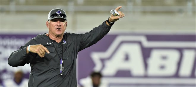 First-year ACU football coach Keith Patterson directs practice on Tuesday at Wildcat Stadium. It was the Wildcats' second practice of fall camp under the former Texas Tech defensive coordinator.