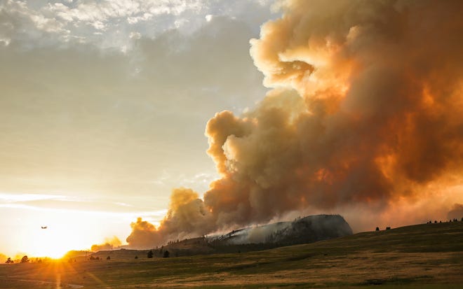 The Elmo Fire burns near Elmo and Dayton, Mont., on the western shore of Flathead Lake on Monday, Aug. 1, 2022.