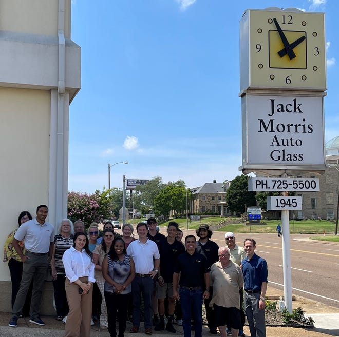 Driven Brands Holdings Inc., based in Charlotte, North Carolina.  Team Jack Morris poses for a photo with the team at Auto Glass.  Driven Brands purchased Jack Morris Auto Glass on 27 July after former owners Paul Morris and his brother John Morris decided they needed to expand the company.
