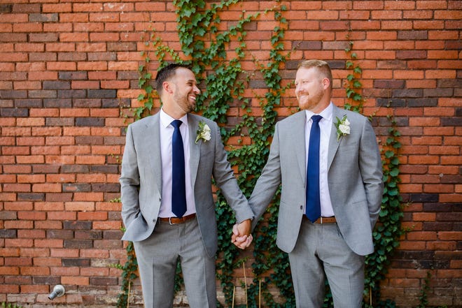 Kyle Richards (left) and John Folk married on Aug. 21, 2021, at Vue Columbus.