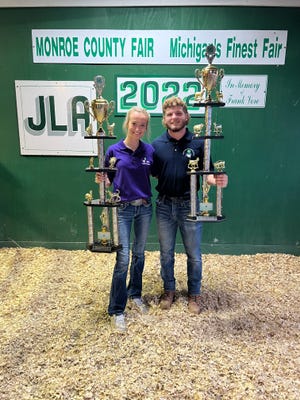 Jaren Schmidt (left) won the Small Animal Sweepstakes at the fair. Stoney Buell won the Large Animal Sweepstakes.