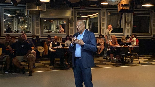 Urban One CEO Alfred Liggans addresses the crowd at a Richmond 8th District meeting at the Satellite Restaurant and Lounge in Richmond Thursday, Aug. 4, 2022.