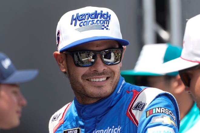 NASCAR Cup Series racer Kyle Larson smiles before the FireKeepers Casino 400 on Aug. 7, 2022 at Michigan International Speedway in Brooklyn.