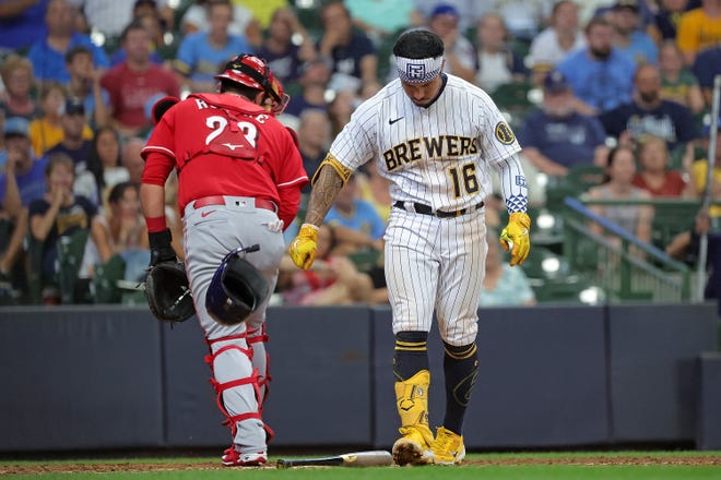 Kolten Wong of the Milwaukee Brewers reacts to a strike out during the eighth inning against the Cincinnati Reds at American Family Field on August 07, 2022 in Milwaukee, Wisconsin.