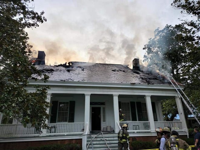 Firefighters work to bring a blaze under control at a house in the 500 block of West Main Street in Schriever just after 4 p.m.  Sunday, Aug. 7, 2022.