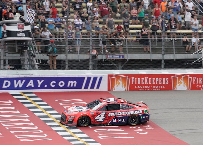 Kevin Harvick crosses the finish line at the Firekeepers Casino 400 at Michigan International Speedway on Sunday.