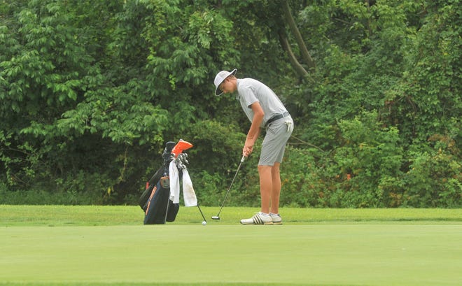 Galion's Nick McMullen putts on No.  6 at The Golf Club of Bucyrus.