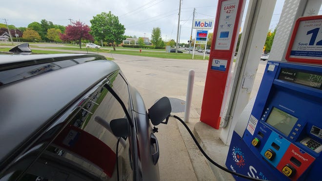 The KIa Sportage Hybrid fills up in Charlevoix for its one stop on the 500 mile round trip.