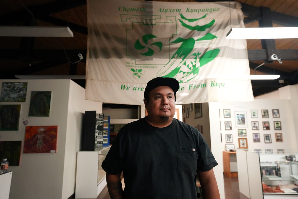 Christopher Nejo, legal analyst and researcher, stands inside the Cupa Cultural Center, which displays historical details and artifacts from the Pala Tribe in San Diego County, on Wednesday, July 27, 2022. 