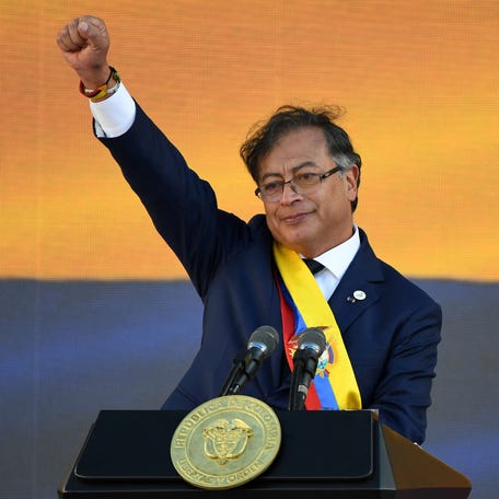 Colombia's new President Gustavo Petro gestures after delivering a speech during his inauguration ceremony at Bolivar Square in Bogota, on August 7, 2022.