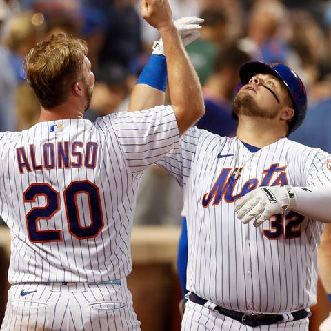 Dan Vogelbach celebrates his home run against the 