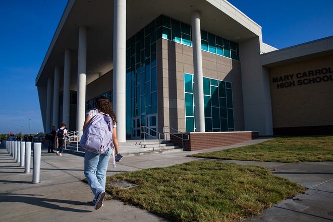 Students stream into the new Carroll High School on Corpus Christi ISD's first day of the 2022-23 school year on Aug. 9, 2022.