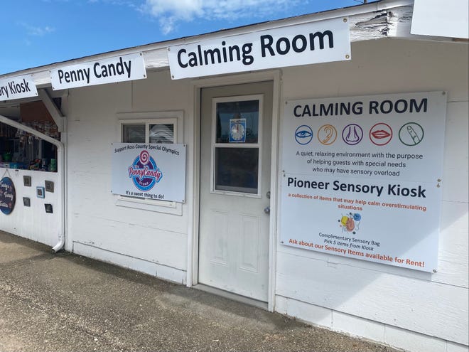 The Pioneer Center's kiosk at the Ross County Fair offers a calming place for children to relax and penny candy for sale.