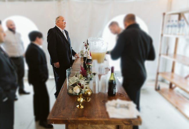 U.S. Representative Billy Long attends the same-sex wedding of Ellen Neville-Verdugo in 2018.