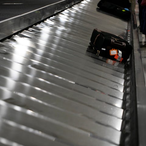 In this June 2, 2021, photo luggage is seen on a c