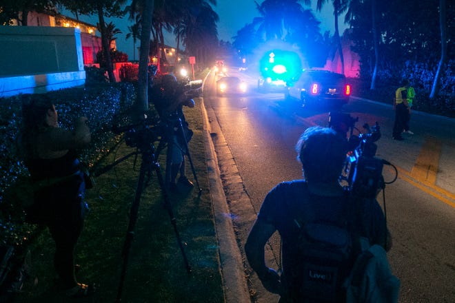 Media stand outside Mar-A-Lago in Palm Beach, FL., on Monday, August 8, 2022.