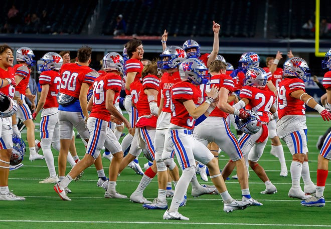 Westlake players celebrate their 40-21 win over Denton Guyer in the Class 6A Division II state championship game Dec. 18 at AT&T Stadium in Arlington. The Chaparrals, which have won three consecutive state titles in Class 6A, are No. 7 and the highest-rated public school squad in MaxPreps preseason national poll for high school football.