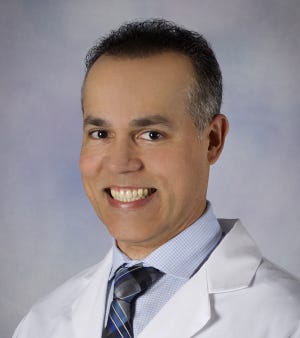 Luis Zayas, a physician with UT Medical Center’s Cole Center.