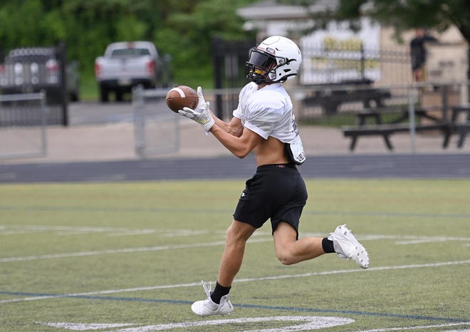 Quaker Valley's Jack Diemert catches a pass during practice Wednesday, August 10 at Chuck Knox Stadium.