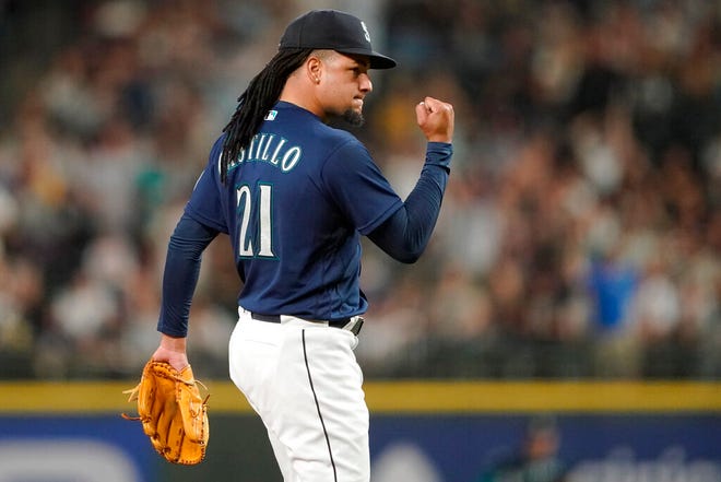 Mariners pitcher Luis Castillo pumps his fist after shutting out the New York Yankees for seven innings on Tuesday. The addition of Castillo may have created the best pitching staff in Seattle history, and may be enough to make the M's a team that can succeed in the playoffs.