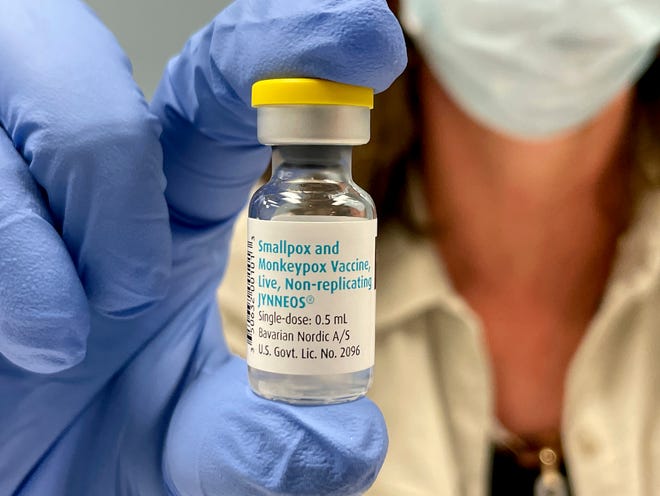 Christine Diatto, 51, of Berkley, is a public health nurse at the Oakland County Health Division in Pontiac and holds up a vial of the monkeypox and smallpox vaccine on Thursday, Aug. 11, 2022.