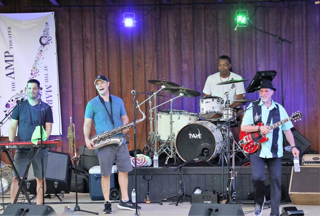Stacy Mitchhart Band performing at AMP concert.