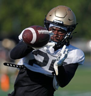 Purdue Boilermakers cornerback Brandon Calloway (26) catches a pass during a football practice, Thursday, Aug. 11, 2022, at Purdue University in West Lafayette, Ind. 