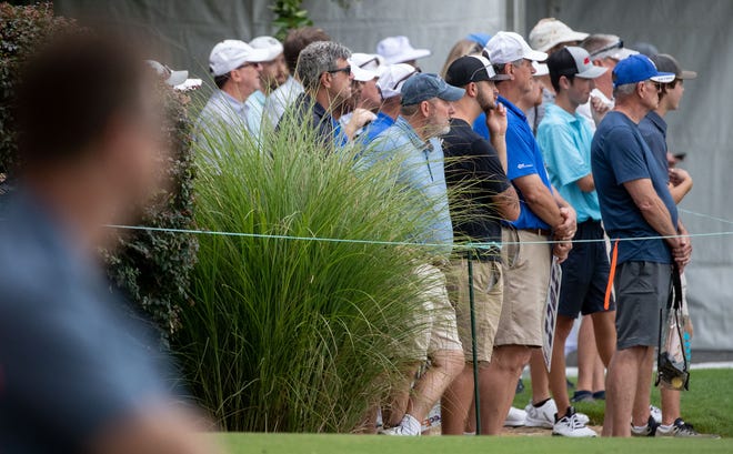 Attendees watch during the first-round of the FedEx St. Jude Championship on Thursday, Aug. 11, 2022, at TPC Southwind in Memphis.
