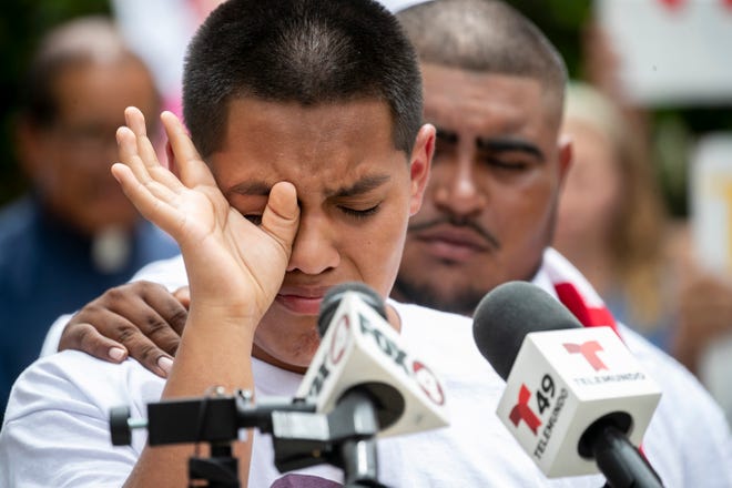 Nicolas Morales Jr. wipes away tears as he speaks at a press conference on Thursday, Aug. 11, 2022, announcing a federal lawsuit stemming from the death of his father, Nicolas Morales, in Immokalee in 2020. Morales was killed by a Collier County Sheriff's Deputy.