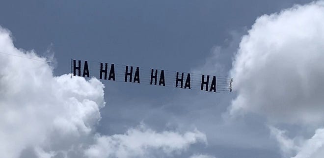 Democratic activist Thomas Kennedy told NBC Miami that he and a group of friends paid $1,800 for a plane to fly a banner plane with the message "ha ha ha ha ha" over Donald Trump's Mar-a-Lago estate on Wednesday, Aug. 10, 2022. The act came while supporters of the former president rallied outside in protest of this week's FBI search of the home.