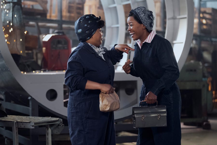 Max (Chanté Adams, right) confides in best friend Clance (Gbemisola Ikumelo) as she tries to keep her factory job a secret from her family.