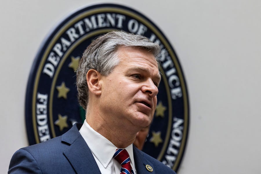 FBI Director Christopher Wray speaks to journalists Aug. 10, 2022, at the Omaha FBI office. Wray addressed threats made to law enforcement after agents raided Mar-a-Lago.