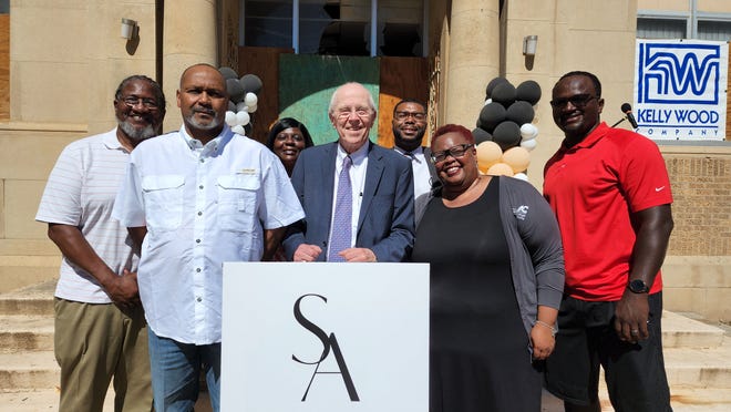 Kent Hance, president of KRS Housing LLC, joins members of the North Heights Advisory Association Friday after the groundbreaking ceremony for The Commons at St. Anthony's affordable apartment facility for seniors in downtown Amarillo.