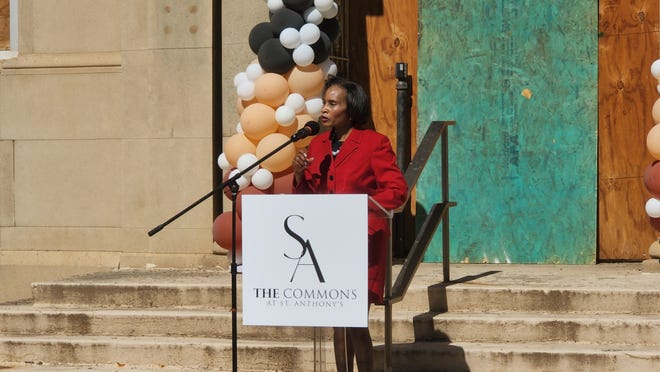 Amarillo Mayor Pro-Tem Freda Powell speaks about the importance of bringing business to the North Heights area Friday during the groundbreaking ceremony for The Commons at St. Anthony's senior apartment facility in downtown Amarillo.