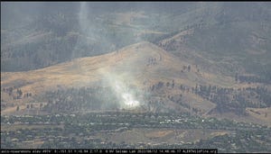 A screenshot from an Alert Wildfire camera shows smoke billowing from a brush fire on Aug. 12, 2022.