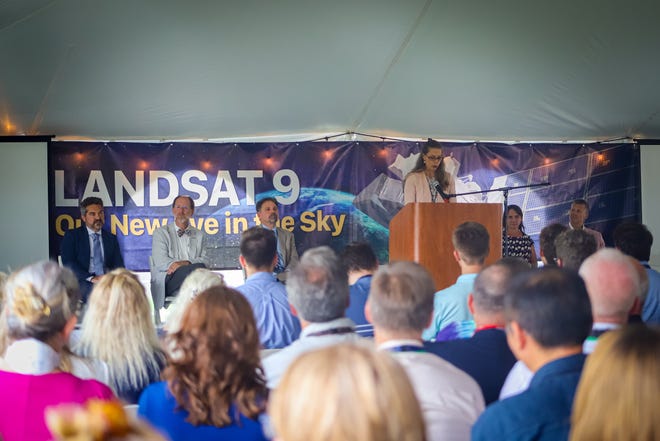 Cathy Richardson speaks in front of a crowd at a ceremony celebrating the Landsat 9 satellite's change in from from NASA to the USGS. The ceremony was held at EROS outside Sioux Falls on Thursday, August 11.