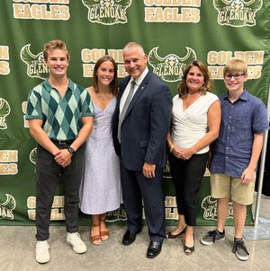 Plain Local Superintendent Brent May has been appointed the president of the Buckeye Association of School Administrators. May, center, is with his family including son Logan, left; daughter Emily; wife Becky; and son Zachary.