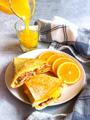 With this Breakfast Tortilla Wrap, you basically view a round tortilla as divided into four quadrants with a single cut from the center to one edge.