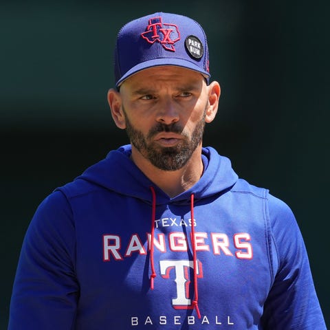 The Texas Rangers fired manager Chris Woodward on 