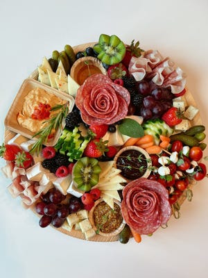 bites on a board specializes in charcuterie boards and other gourmet food products.