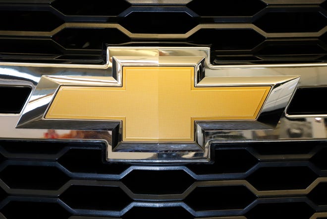 The Chevrolet logo is displayed at the 2020 Pittsburgh International Auto Show Thursday, Feb.13, 2020 in Pittsburgh.  General Motors is recalling more than 484,000 large SUVs in the U.S., Tuesday, Aug. 16, 2022, to fix a problem that can cause the third-row seat belts to malfunction. The recall covers Chevrolet Suburbans and Tahoes, Cadillac Escalades and GMC Yukons from 2021 and 2022.