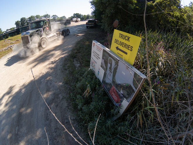 Beyond this entrance off Lucy Road in Genoa Township shown Tuesday, Aug. 16, 2022, construction is underway near Livingston County Catholic Charities, which has filed a lawsuit regarding potential noise from the PADNOS shredding building being erected.