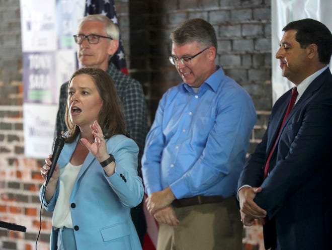 Democratic nominee for lieutenant governor Sara Rodriguez addresses supporters during a campaign stop Aug. 10 in Stevens Point. Behind her are Gov. Tony Evers, from left; Brad Pfaff, the Democratic nominee for Wisconsin's 3rd Congressional District; and Attorney General Josh Kaul.