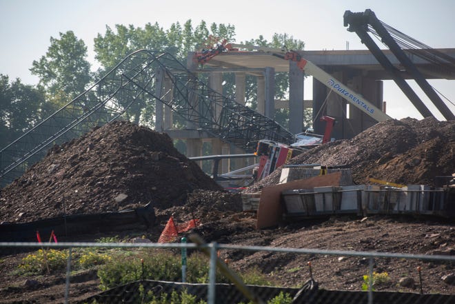A crane collapsed at the Steel District construction site in Sioux Falls on Tuesday, August 16, 2022.